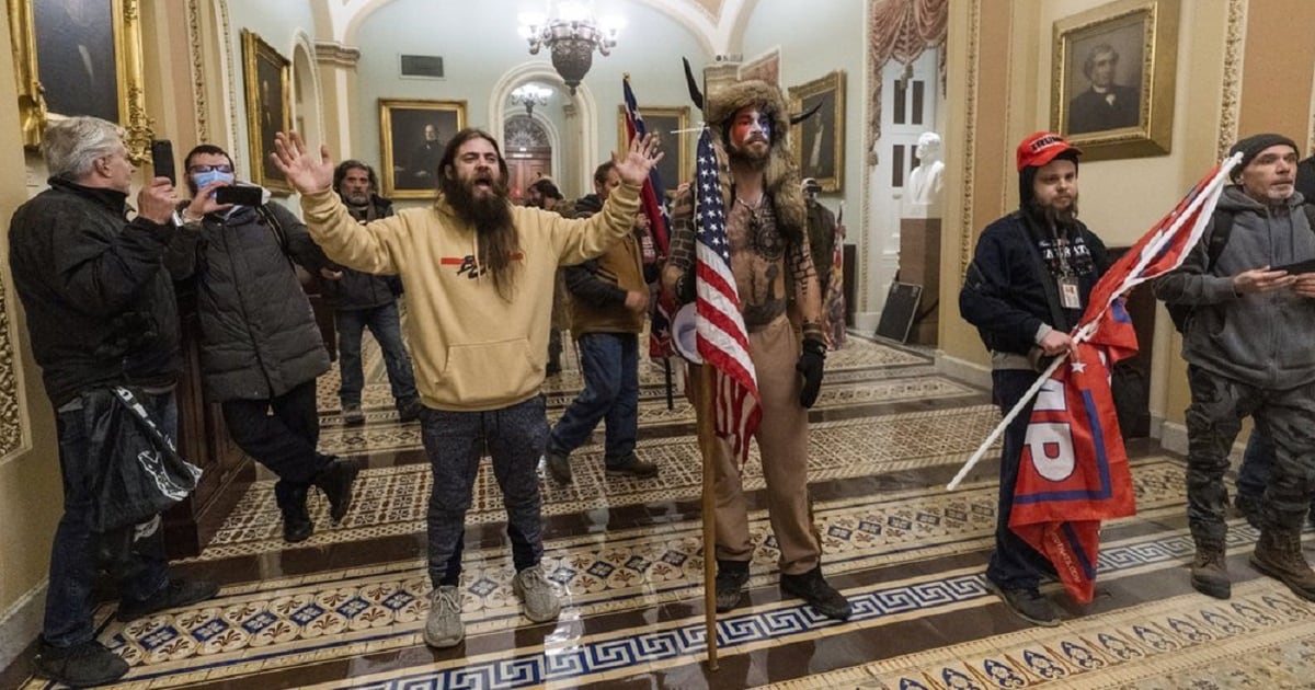 qanon-shaman-charged-with-storming-the-capitol-is-a-navy-veteran