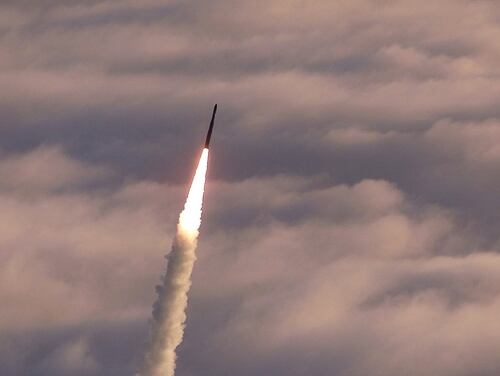 An unarmed Minuteman II intercontinental ballistic missile launches from Vandenberg Air Force Base, Calif. (U.S. Air Force via Getty Images)