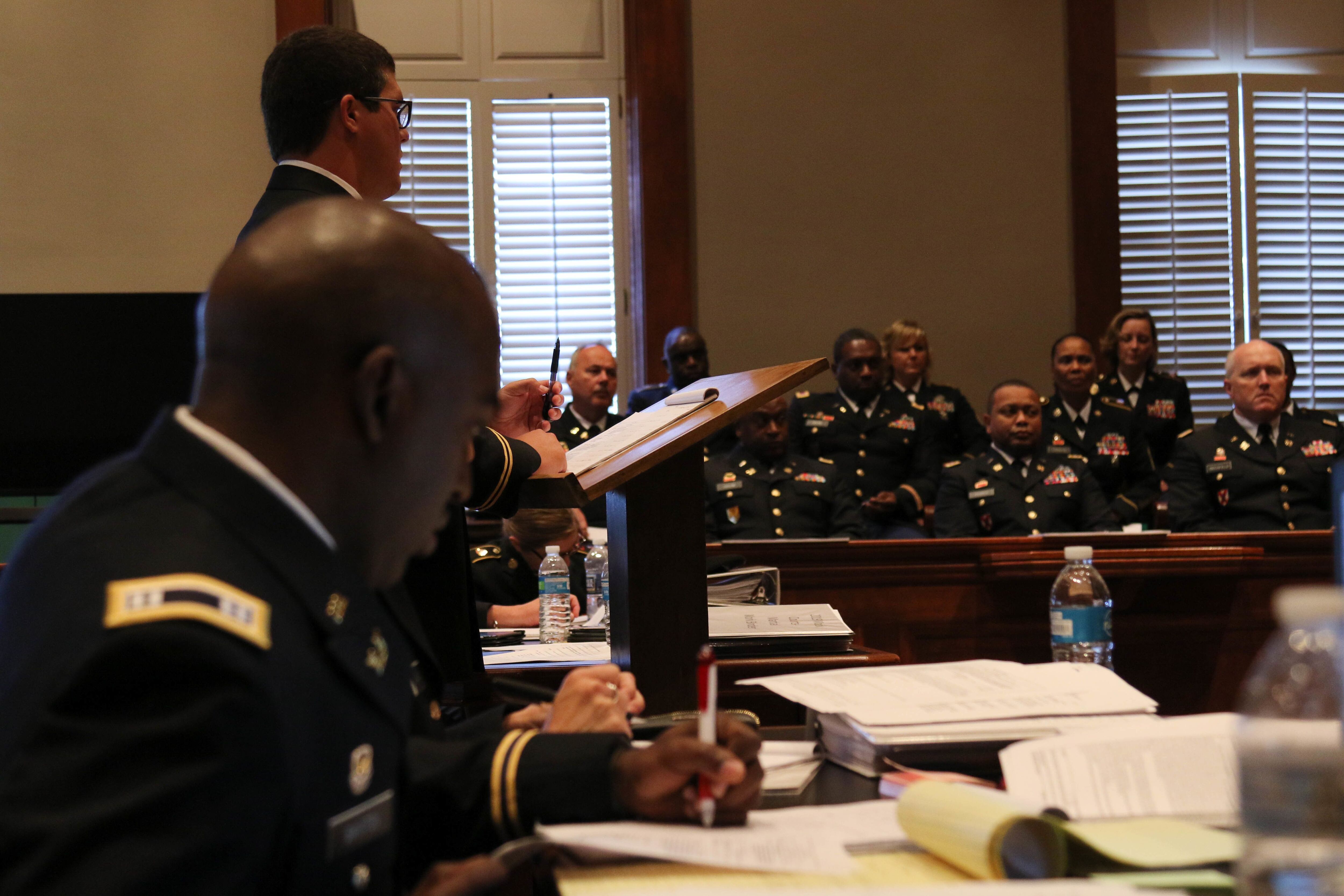 1st Lt. Charlton T. Pope, Alabama National Guard, questions a key witness during the 167th Theater Sustainment Command’s 5th Annual mock trial at the Calhoun County Courthouse, Anniston, Alabama, July 31, 2019. (Staff Sgt. Katherine Dowd/Army)
