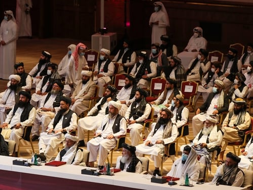 Members of the Taliban delegation attend the opening session of the peace talks between the Afghan government and the Taliban in the Qatari capital Doha on Sept. 12, 2020. (Karim Jaafar/AFP via Getty Images)
