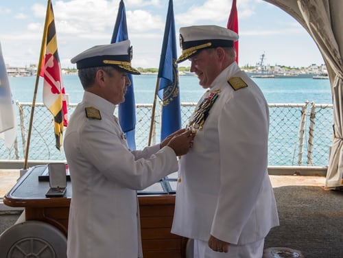 Retired Rear Adm. Mark C. Montgomery, right, was censured by the Navy this month for his role in the 