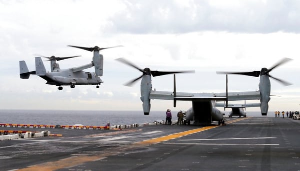 A U.S. Marine MV-22B Osprey aircraft lands on the deck of the Bonhomme Richard amphibious assault ship off the coast from Sydney during events marking the start of Talisman Saber 2017. (Jason Reed/Pool Photo via AP, File)