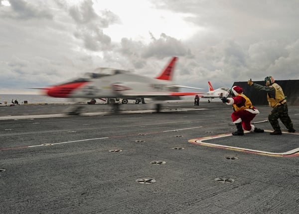 Santa Claus gives the signal to launch a T-45C Goshawk from Training Air Wing Two on the flight deck of the aircraft carrier George Washington in late 2016. George Washington was underway in the Atlantic Ocean. (Navy)