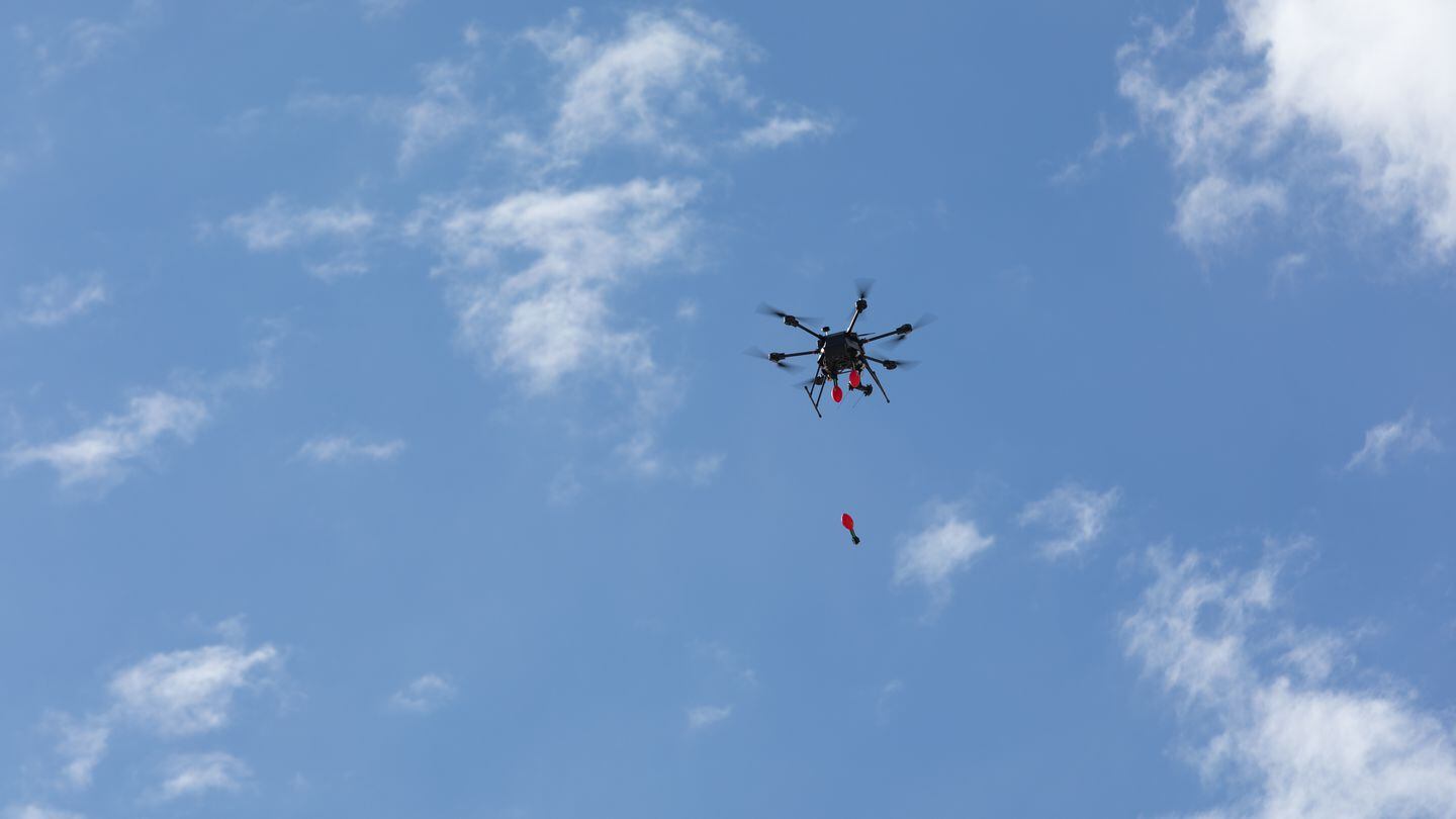 A drone deploys munitions during experimentation at Project Convergence in Fort Irwin, Calif., on March 18, 2024. The drone employs interchangeable anti-personnel and anti-armor warheads at multiple targets. (Sgt. Brahim Douglas/U.S. Army)
