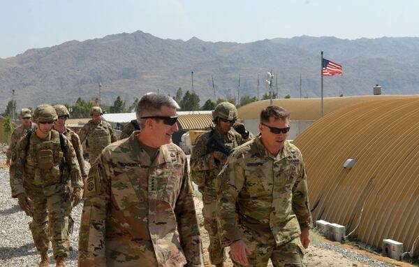 U.S. Army Gen. John Nicholson, Resolute Support and U.S. Forces-Afghanistan commander, walks with Brig. Gen. John Brennan, Train, Advise and Assist Command-East commander, during a battlefield circulation on Aug. 9, 2018, in Laghman province. (Cmdr. Robert Thoms/NATO)