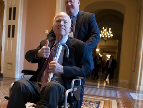 Sen. John McCain, R-Ariz., leaves a closed-door meeting with Republican leaders on Dec. 1, 2017. Officials from Vietnam Veterans of America are demanding an apology from the White House on McCain's behalf after a staffer there mocked his health. (J. Scott Applewhite/AP)