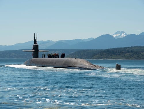 The Ohio-class ballistic missile submarine Nebraska returns home to Naval Base Kitsap-Bangor, Wash., following a 2013 patrol. (Navy)
