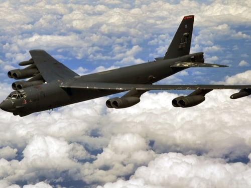 A B-52 Stratofortress deployed to RAF Fairdford, England, from Barksdale Air Force Base, La., prepares to refuel midair with a KC-135 Stratotanker from RAF Mildenhall, England, over the U.K. on June 11, 2014. (Senior Airman Christine Griffiths/U.S. Air Force)
