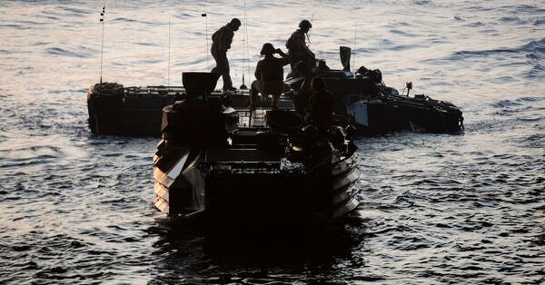 Marines with Combat Assault Battalion, 3rd Marine Division, embark amphibious assault vehicles onboard the amphibious transport dock Green Bay during Blue Chromite 2017 in the waters of Okinawa, Japan, October 29, 2016. (Lance Cpl. Jesus McCloud/Marine Corps)