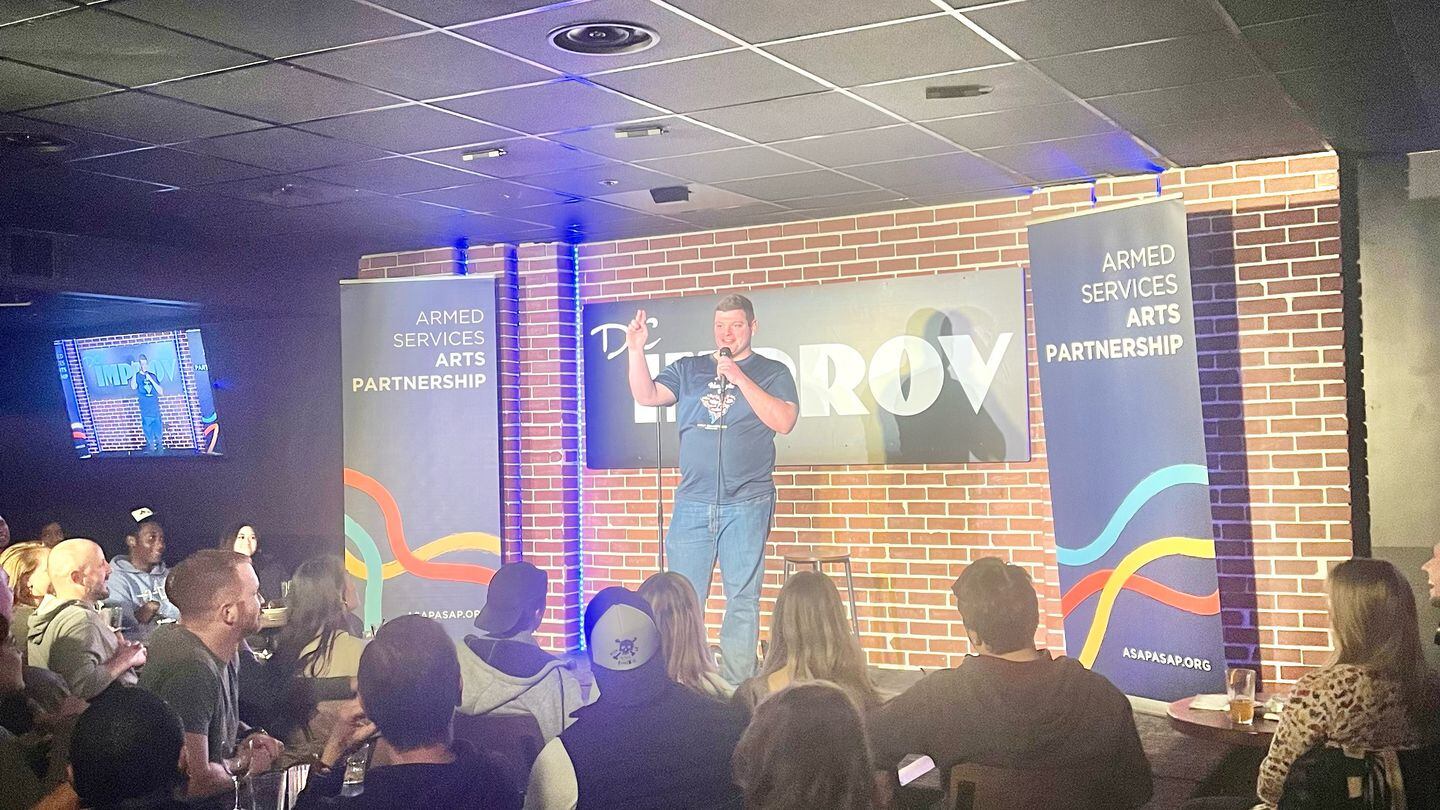 Navy Lt. Joey Deaven performs at the ASAP comedy bootcamp graduation showcase on May 3, 2023, at the DC Improv in Washington, D.C. (Courtesy of Melissa A. Sullivan)