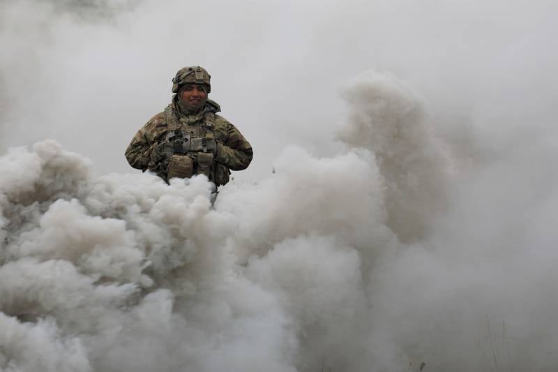 A soldier assigned to 3rd Battalion, 67th Armor Regiment walks through smoke on the battlefield on Sept. 26, 2020, at Hohenfels Training Area, Germany, as part of Combined Resolve XIV.
