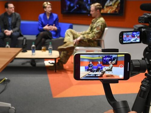 Air Force Secretary Barbara Barrett, center, has a fireside chat for Pitch Bowl with Will Roper, left, assistant secretary of the Air Force for acquisition, technology and logistics, in Arlington, Va., on March 12, 2020. (Andy Morataya/U.S. Air Force)
