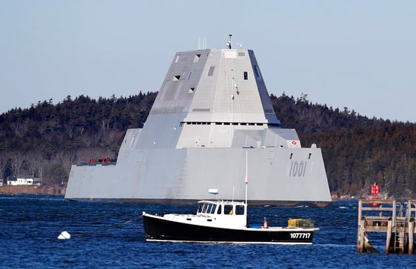The future USS Michael Monsoor passes Fort Popham travels down the Kennebec River as it heads out to sea for trials, Monday, Dec. 4, 2017, in Phippsburg, Maine. The ship is the second in the stealthy Zumwalt class of destroyers. (Robert F. BukatyAP)