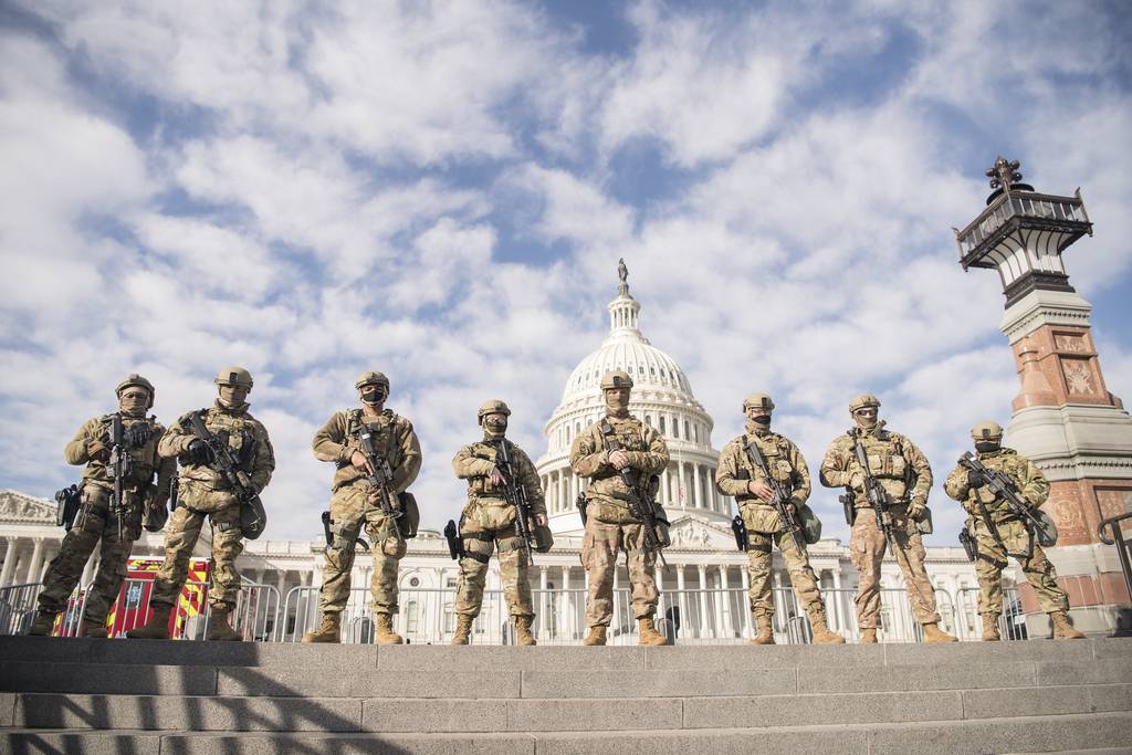 Virginia National Guard airmen assigned to the 192nd Security Forces Squadron, 192nd Mission Support Group, 192nd Wing help to secure the grounds near the U.S. Capitol, Jan. 13, 2021, in Washington.