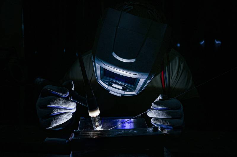 Staff Sgt. Adam Kitta welds metal recertification welding plates at the Pittsburgh International Airport Air Reserve Station, Pa., Oct. 29, 2020.
