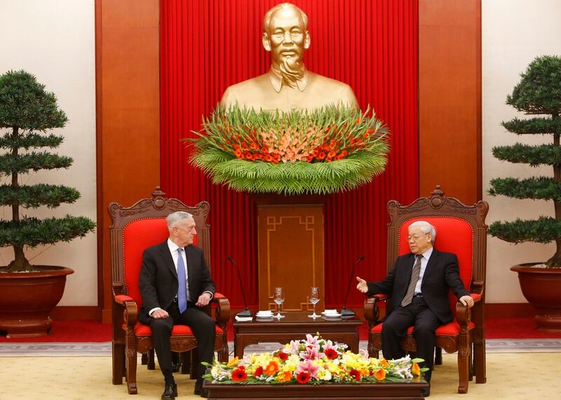 In this Jan. 25 photo, U.S. Secretary of Defense Jim Mattis, left, listens during talks with Vietnam's Communist Party General Secretary Nguyen Phu Trong in Hanoi, Vietnam. Mattis is planning to make his second visit to Vietnam this year, signaling how vigorously the Trump administration is trying to counter China's military assertiveness in the South China Sea by building up relations with smaller nations in the region. (Tran Van Minh/AP)