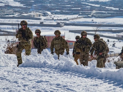 U.S. soldiers hike up a snow-covered hill to take part in a key leader engagement Jan. 16, 2020, in southeastern Afghanistan. (Staff Sgt. Nicholas Brown-Bell/Army)