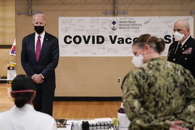 President Joe Biden tours the COVID-19 vaccine center at Walter Reed National Military Medical Center, Friday, Jan. 29, 2021, in Bethesda, Md.