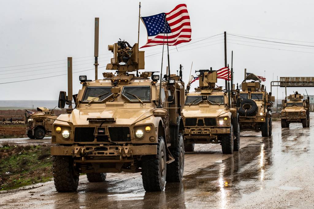 American soldiers patrol Syria's M4 highway