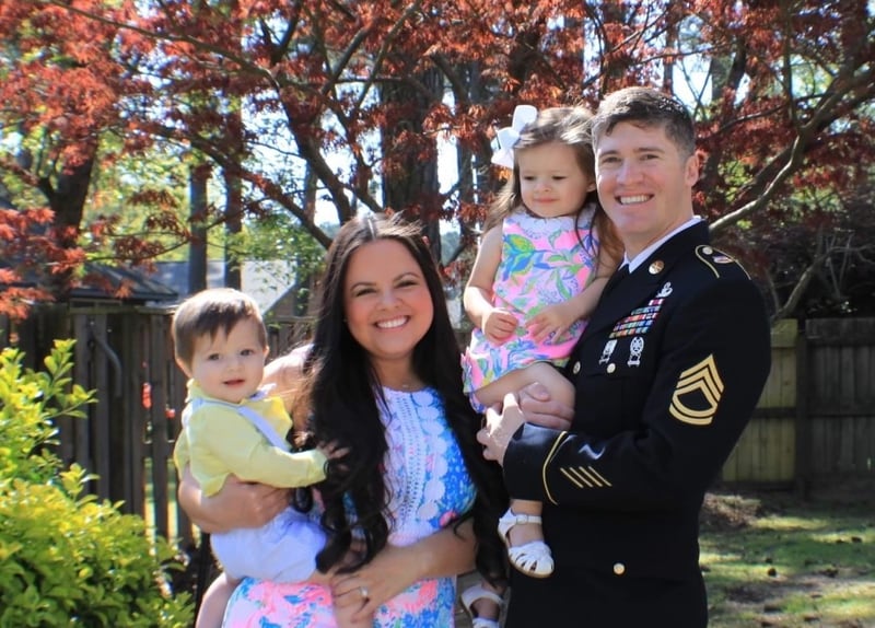 Sgt. 1st Class Robert Nicoson pictured with his wife, Beverly, and two children. (Courtesy of the Nicoson family)