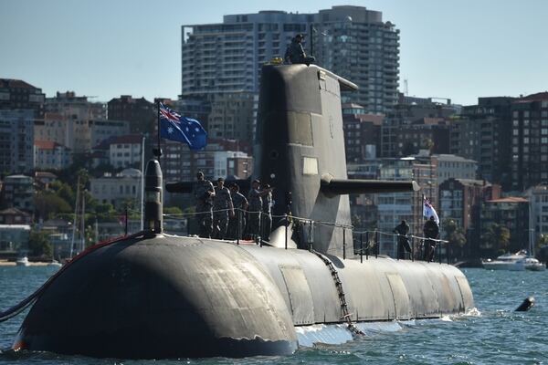 The Royal Australian Navy's HMAS Waller (SSG 75), a Collins-class diesel-electric submarine, is seen in Sydney Harbour on November 2, 2016. Australia on April 2016 awarded French contractor DCNS, now Naval Group, the main contract to design and build its next generation of submarines to replace its current fleet of six Collins-class vessels. The company is now negotiating the strategic partnering agreement, which is a critical step toward building the diesel-electric boats. (Photo credit should read PETER PARKS/AFP/Getty Images)