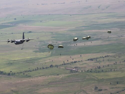 Georgia Special Forces soldiers jump out of a C-130 during a combined airborne operation, near Tbilisi, Republic of Georgia, on Aug. 4, 2017. (Sgt. Kalie Jones/Army)