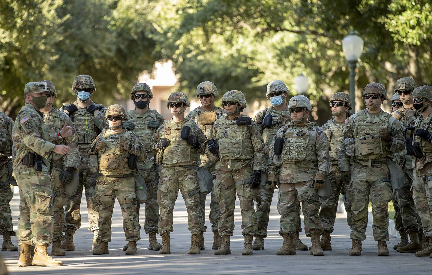 Soldiers with the Texas Army National Guard gather at the Capitol in Austin, Texas, on election day Tuesday, Nov. 3, 2020.