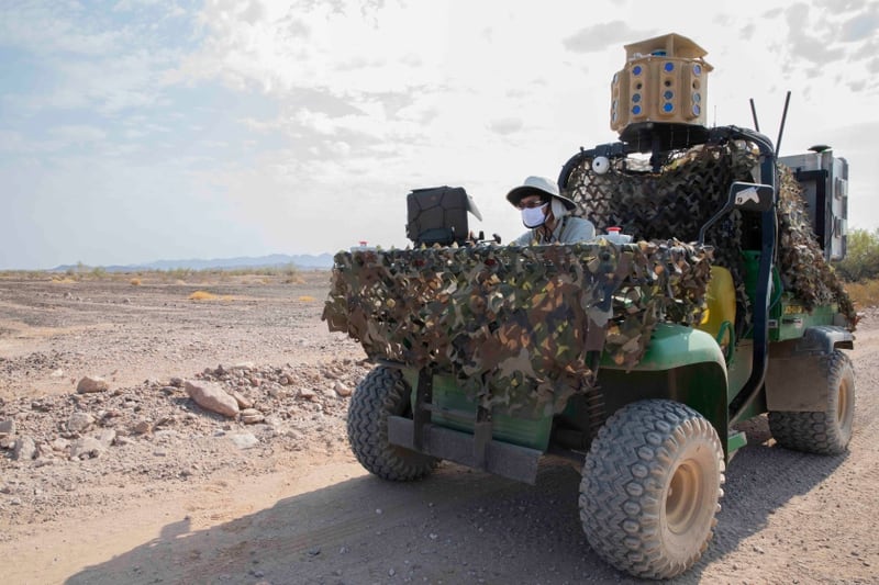 Felix Jonathan, a robotics engineer from Carnegie Mellon University, inputs data into an autonmous ground vehicle control system during Project Convergence at Yuma Proving Ground, Arizona. (Spc. Carlos Cuebas Fantauzzi/Army)