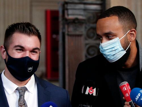 Alek Skarlatos, left, and Anthony Sadler, right, deliver a speech during the Thalys attack trial at the Paris courthouse, Friday, Nov. 20, 2020. (Francois Mori/AP)