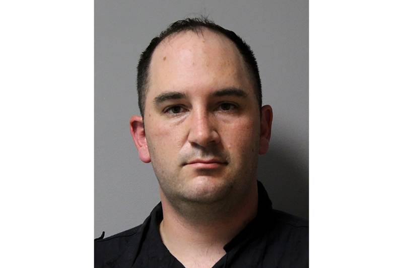 This booking photo provided by the Austin, Texas, Police Department shows Army Sgt. Daniel Perry.