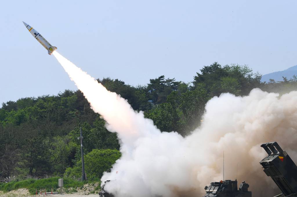 In this photo provided by South Korea Defense Ministry, a missile is fired during a joint training between U.S. and South Korea at an undisclosed location in South Korea, on May 25, 2022.