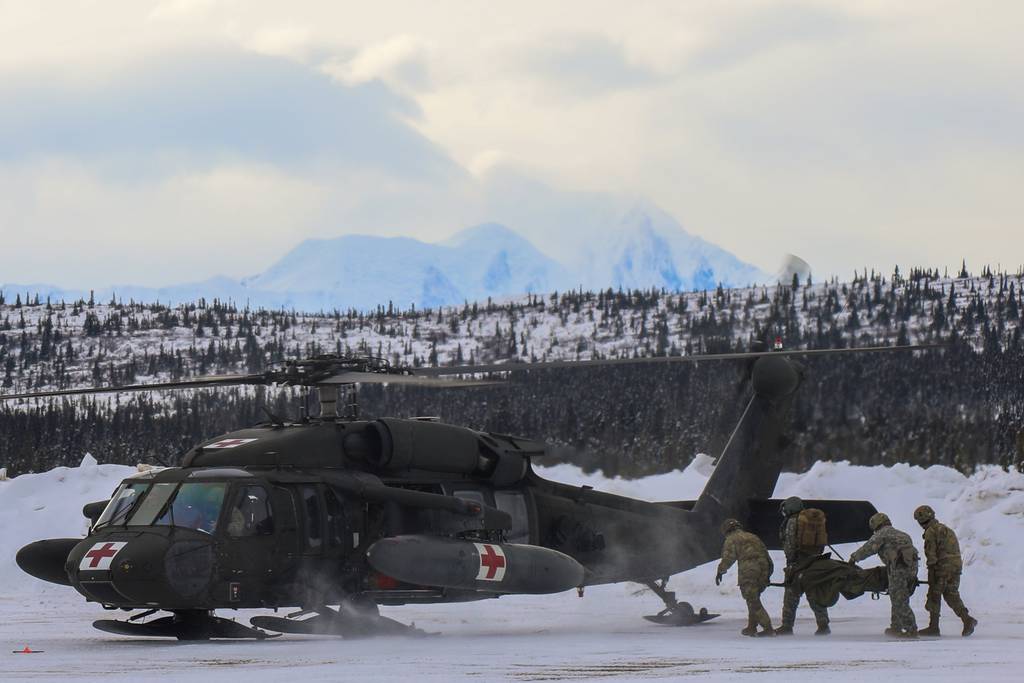 Soldiers conduct a MedEvac rehearsal near Fort Greely, Alaska, March 8, 2022. (Maj. Jason Welch/Army)