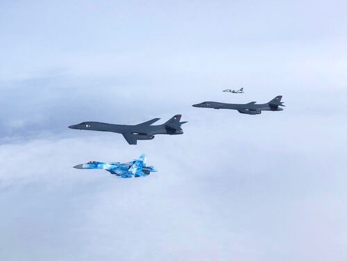 A Ukrainian Su-27 Flanker and MiG-29 Fulcrum escort two B-1B Lancers during a training mission for Bomber Task Force Europe on May 29, 2020, in the Black Sea region. Ukraine's Air Force consists mainly of older Russian-made equipment. (Courtesy of the Ukrainian Air Force)