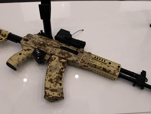 An AK-12 assault rifle on display at a Russian arms show. The rifle was selected by the Russian Defense Ministry to be fielded to the country's ground, airborne and naval infantry forces this year. (Vitaly V. Kuzmin/Wikimedia Commons)