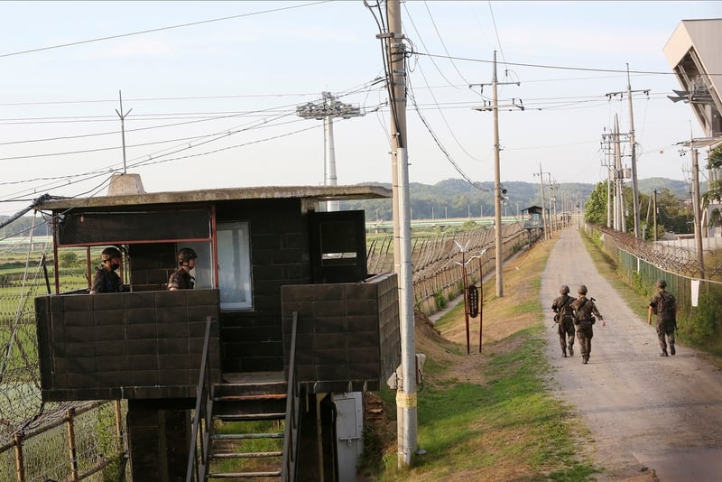 South Korean army soldiers patrol along the barbed-wire fence in Paju, South Korea, near the border with North Korea, Monday, June 15, 2020. (Ahn Young-joon/AP)