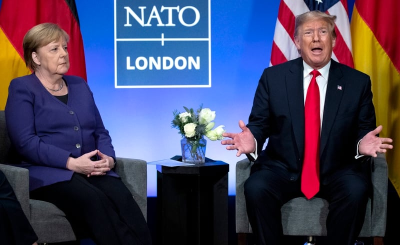 In this Dec. 4, 2019, file photo President Donald Trump meets with German Chancellor Angela Merkel during the NATO summit at The Grove in Watford, England. (Evan Vucci/AP)