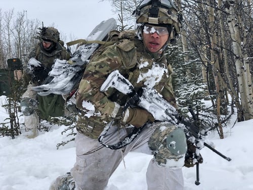 Pvt. Drew Olson, an infantryman assigned to 1st Stryker Brigade Combat Team, 25th Infantry Division, rehearses Stryker dismount techniques with his company during exercise Arctic Edge 2018 near Fort Greely, Alaska. (Capt. Richard Packer/Army)