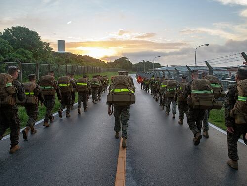 Marines participate in a 10 kilometer hike on Camp Hansen, Okinawa, Japan, July 12, 2019. (Lance Cpl. D’Angelo Yanez/Marine Corps)