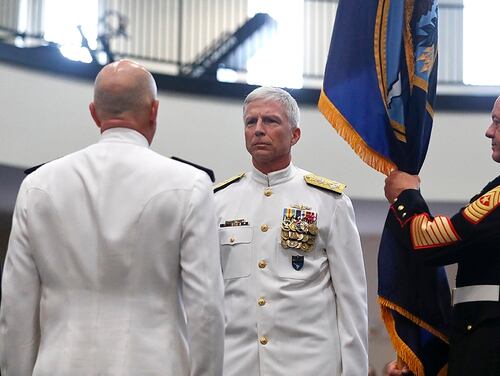 Secretary of Defense James Mattis, left, Adm. Kurt Tidd, center left, Adm. Craig Faller, center right, stand during a change of command ceremony at the U.S. Southern Command headquarters on Monday, Nov. 26, 2018, in Doral, Fla. The ceremony appointed Faller as new leader of the command that oversees U.S. military operations in Latin America and the Caribbean. (Brynn Anderson/AP)