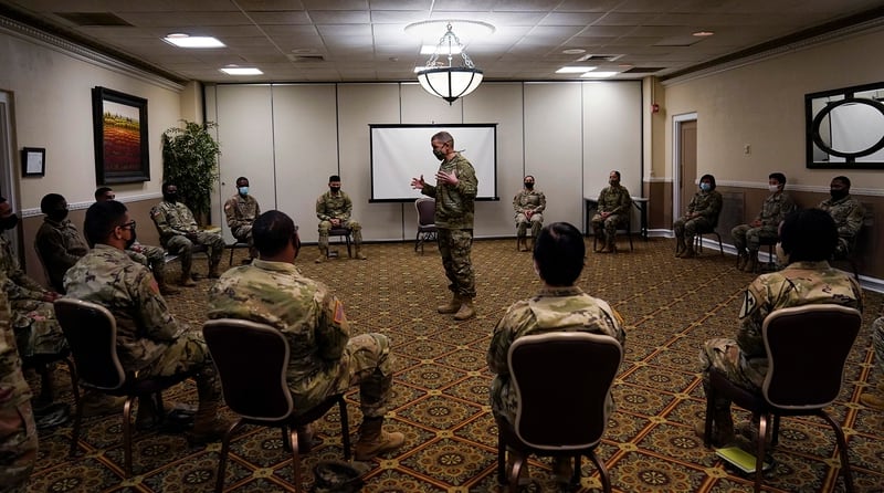 Sergeant Major of the Army Michael Grinston, center, gets feedback from soldiers about their concerns at Fort Hood, Texas, Thursday, Jan. 7, 2021. (Eric Gay/AP)