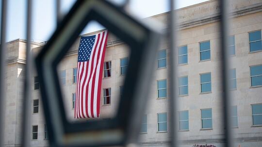 Unfurled at dawn, an American flag hangs over the Pentagon on Sept. 11, 2019. (Lisa Ferdinando/Department of Defense)