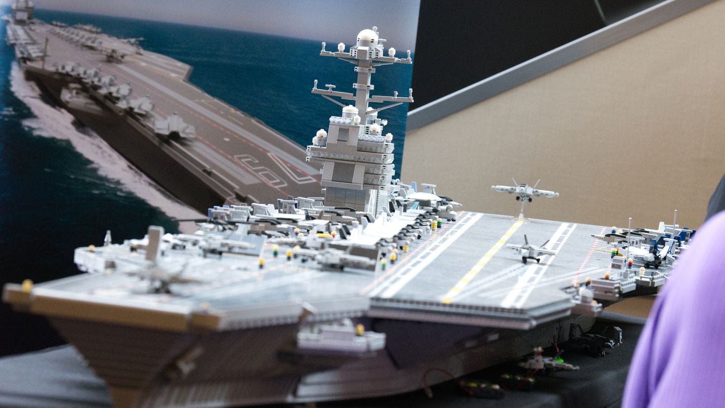 A Lego model of the USS John F. Kennedy is displayed at the 2024 Sea-Air-Space defense conference. It was a crowd favorite. (Colin Demarest/C4ISRNET)