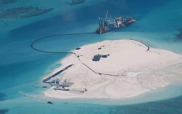 This photo taken Feb. 25, 2014, and received from the Philippine Department of Foreign Affairs on April 13, 2015, shows an aerial shot of what appears to be a large-scale reclamation by China on the Chinese-held Johnson South Reef, which is also claimed by the Philippines and Vietnam, in what is part of the disputed Spratly chain. (AFP via Philippine Department of Foreign Affairs)