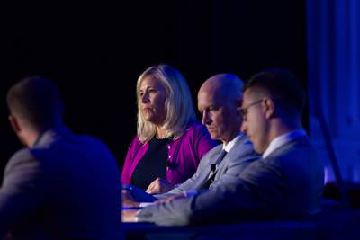Laura Cressey, Michael Miller and Kusti Salm, officials representing the State Department, Defense Department and the Estonian Ministry of Defense, are seen Sept. 6, 2023, at the Defense News Conference.