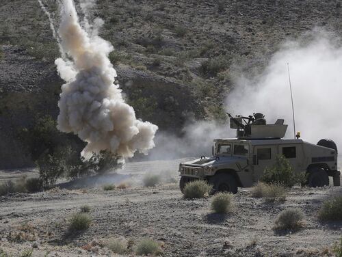 Soldiers with the 155th Brigade Combat Team react to a simulated ambush during a rotation at the National Training Center at Fort Irwin, Calif., June 5, 2017. (Spc. Daniel Parrott/Army)