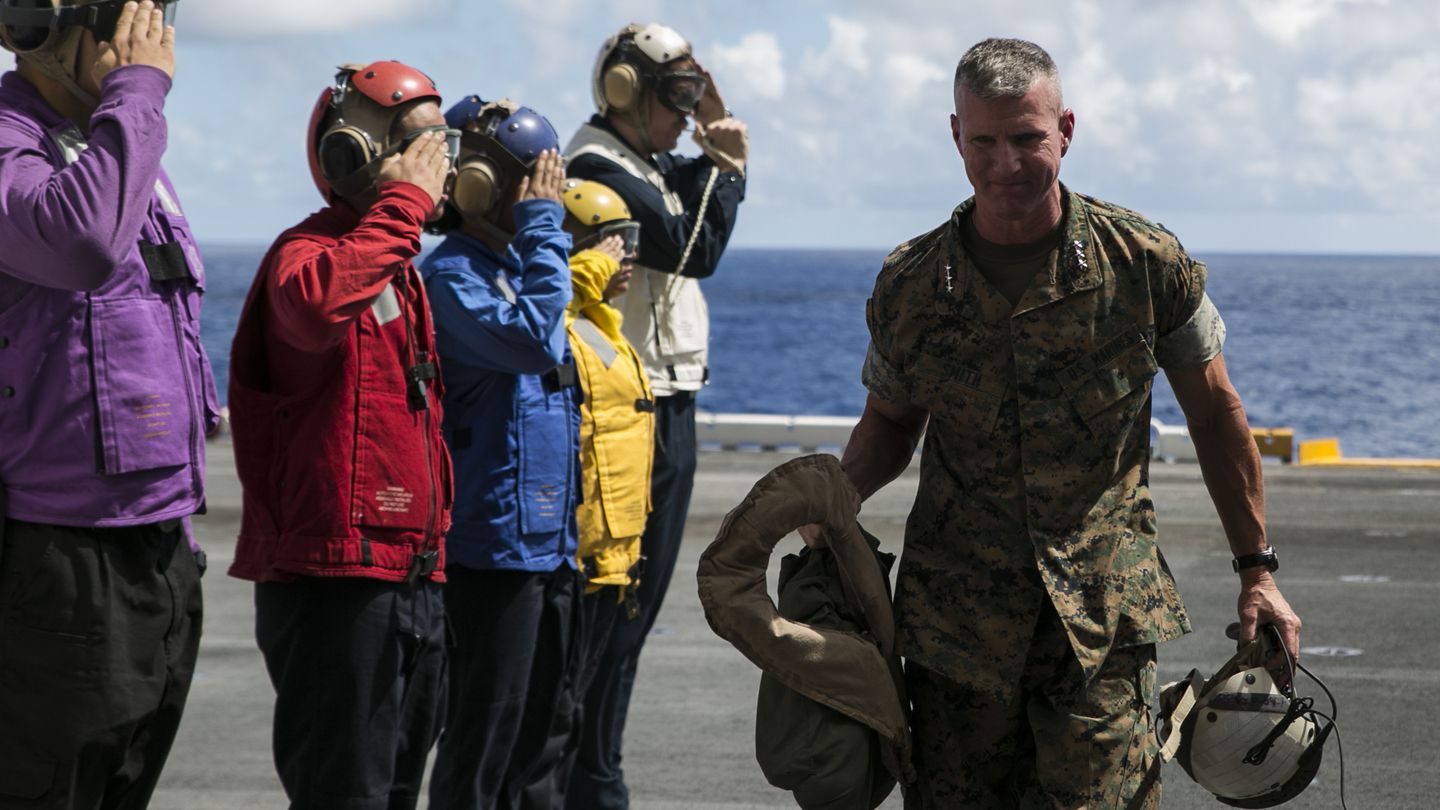 Then-Lt. Gen. Eric Smith, III Marine Expeditionary Force commanding general, boards the amphibious assault ship Wasp (LHD 1) while underway off the coast of Okinawa, Japan, in 2018. (Lance Cpl. Hannah Hall/Marine Corps)