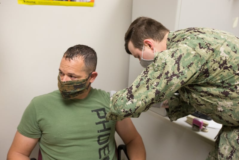 U.S. Marine Corps Sgt. Maj. James Robertson, the enlisted leader of Marine Corps Air Station Cherry Point, North Carolina receives the Moderna COVID-19 Vaccine on Dec. 23, 2020. (Marine Corps)