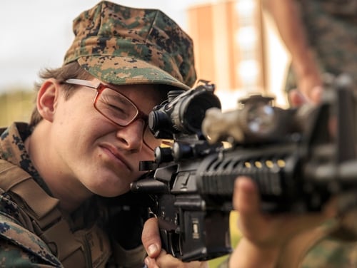A Marine corporal sights in during Female Engagement Team training at Camp Lejeune, N.C., on Sept. 10, 2018. Female lawmakers are again pushing for a change to the VA motto, arguing it diminishes the contribution of female troops. (Lance Cpl. Tawanya Norwood/Marine Corps)