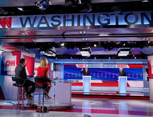 Former Vice President Joe Biden, center, and Sen. Bernie Sanders, I-Vt., far right, participate in a Democratic presidential primary debate at CNN Studios in Washington on March 15, 2020. (Evan Vucci/AP)