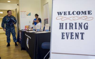 A sailor attends a free hiring event held for service members, veterans and military spouses at Joint Base Pearl Harbor-Hickam's Military & Family Support Center, June 22, 2017.